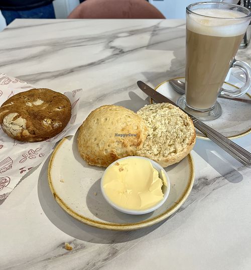 Lemon scone and Biscoff stuffed cookie with an oat milk latte    at Tiers and Sprinkles in Leyburn