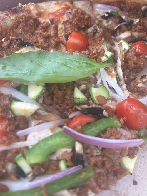 Vegetarian pizza with our own home brought violife Mozarella and crumbled beyond hot Italian sausage.  Wish they had vegan cheese and meat but this allowed us to try their pizza.   at Tarantella Ristorante in Weston-super-mare