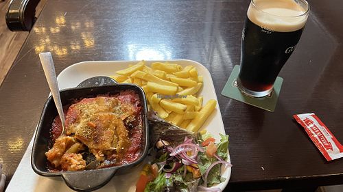 This is the afore mentioned vegan lasagna. I didn’t know it comes with fries. They were okay (not fantastic), but I wish they had served more of the delicious lasagna instead.   at Kelly's Bar in Birr