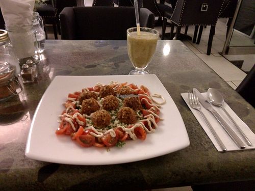 raw main dish and smoothie at The Hive in West London