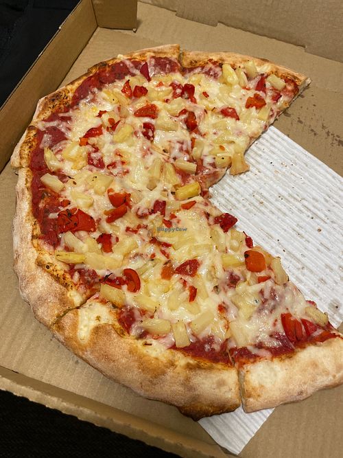 Vegan! Got a medium pizza with roasted red pepper, pineapple, and vegan cheese. at Giovanni's Restaurant and Bar in Mammoth Lakes