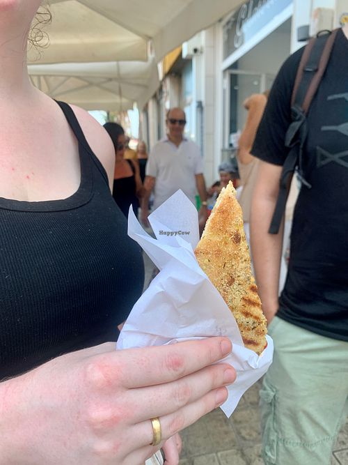 Lara trying the caponata pizzolo at Vegan Food Tour Ortigia in Siracusa
