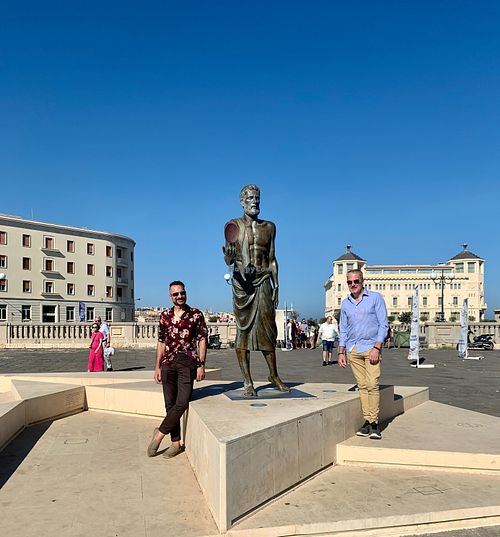 Michael & Sam are hanging out with Archimedes!  at Vegan Food Tour Ortigia in Siracusa