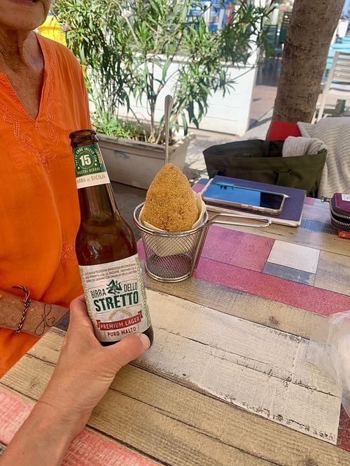 Vegan Sicilian beer and epic street food, arancino! April 2024 at Vegan Food Tour Ortigia in Siracusa