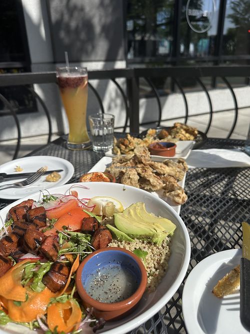 Salad with Maha mushrooms fish, corn ribs, and okra   at Buddha Belly Burger in Sacramento