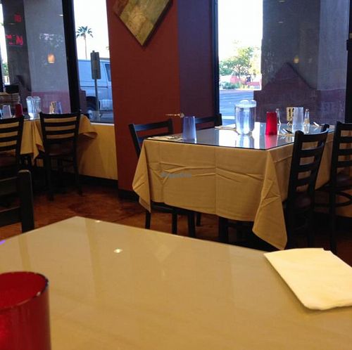 open water pitchers on tables at Madras Ananda Bhavan in Phoenix