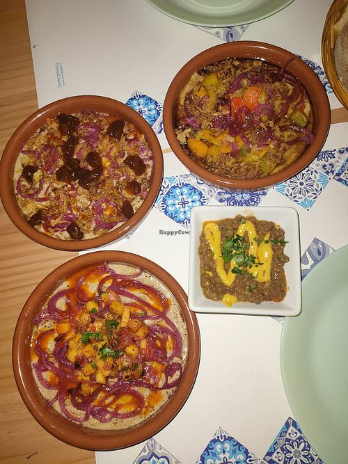 Tris di hummus e assaggio di lenticchie in latte di cocco e spezie. at Casbah del Moro in Catania