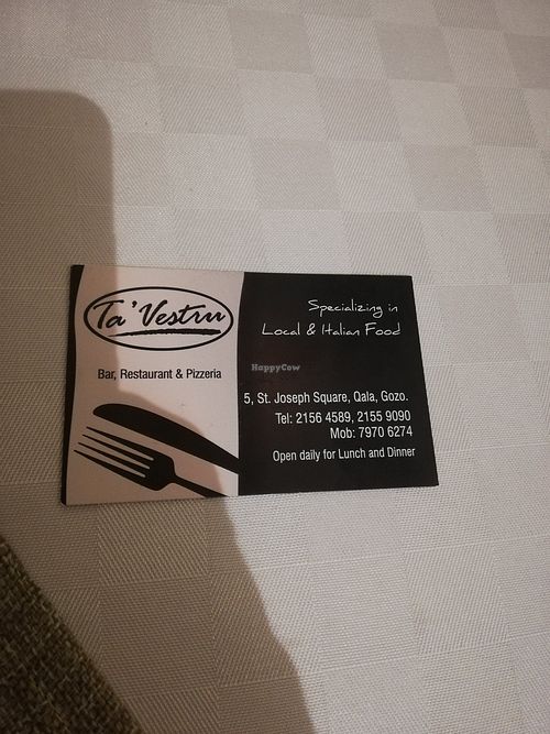 Business card including phone numbers for reservation at Ta' Vestru in Qala