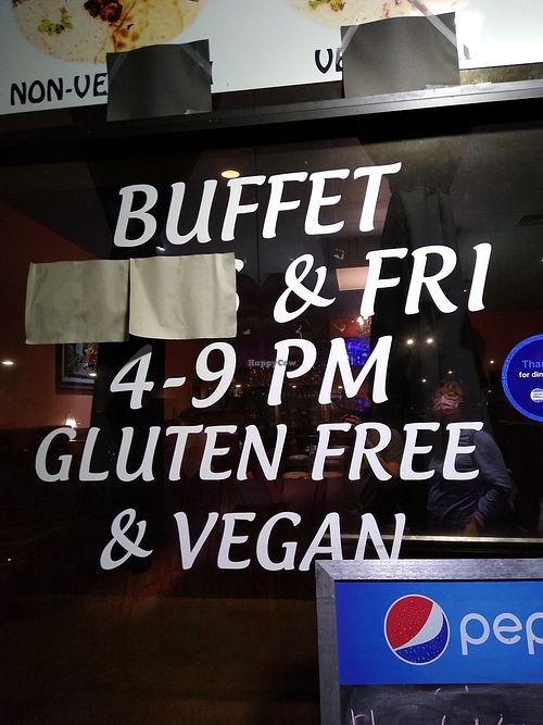 Jan 2022 gluten free and vegan buffet sign for Fridays at Shivalik Indian Cuisine in Kapaa