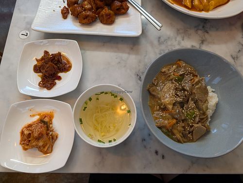 Bulgogi with accompaniments - soup, lotus root, kim chi at Vegan Insa - 비건인사 in Seoul
