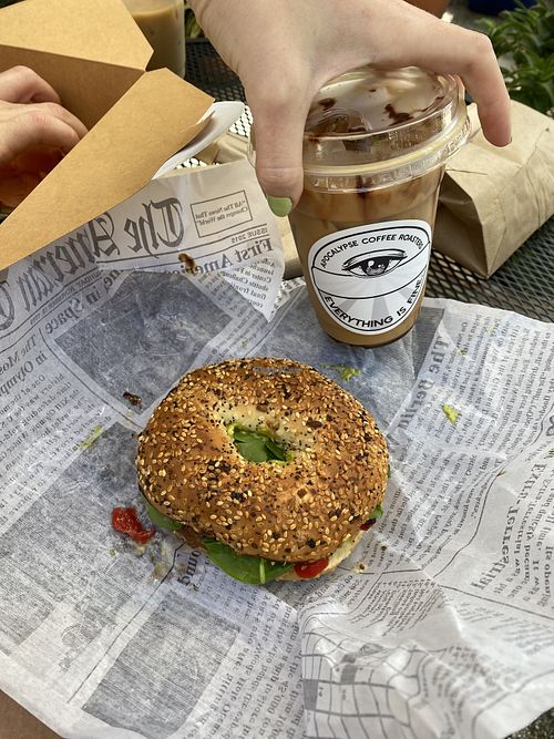 Solar Eclipse BreakFast sandwich & speciality coffee with oat milk  at Apocalypse Coffee Roasters in Melbourne
