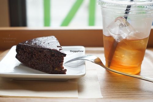 Vegan sachertorte with iced tea. at Genmai Cafe in Osaka