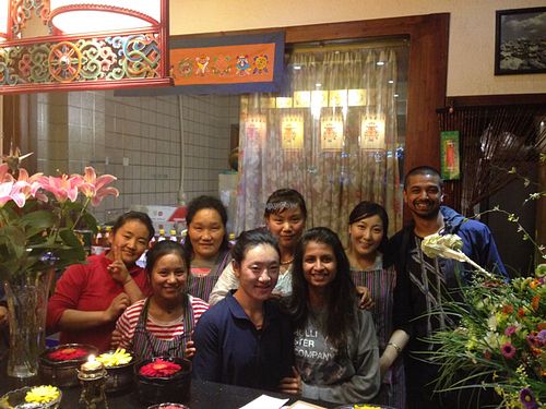 selfie with the excellent staff!  at Tse Bai Lin Vegetarian Restaurant in Tibet