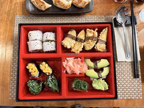Vegetable sushi platter (avocado, mix veg, tempura aubergine, corn, seaweed salad) with gyozas  at West View Restaurant in Windermere