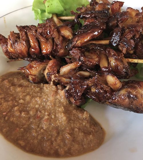 Sate jamur made with mushrooms with a peanut sauce   at Siboghana Waroeng in Ubud