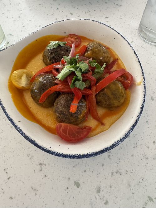 Vegan meatballs on cheddar gritss  at Disneyland - River Belle Terrace   in Anaheim