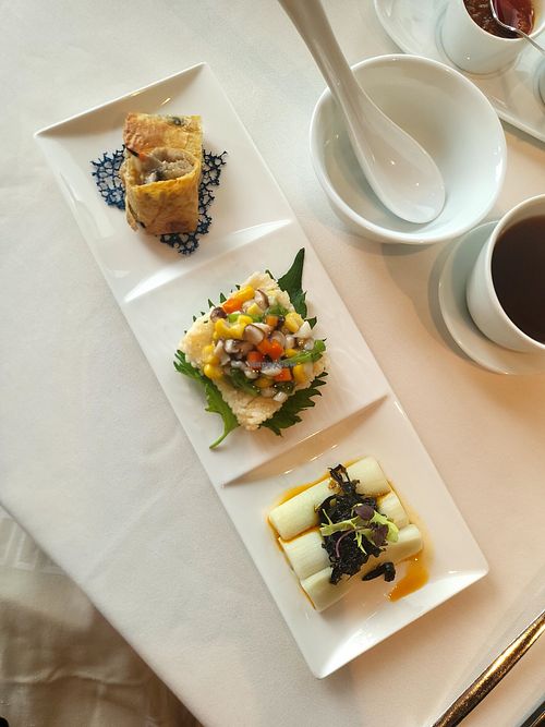 Appetizer trio: crispy tofu sheet, crispy rice w veg, mushroom, marinated eggplant w preserved mushrooms at Lung King Heen in Hong Kong Island