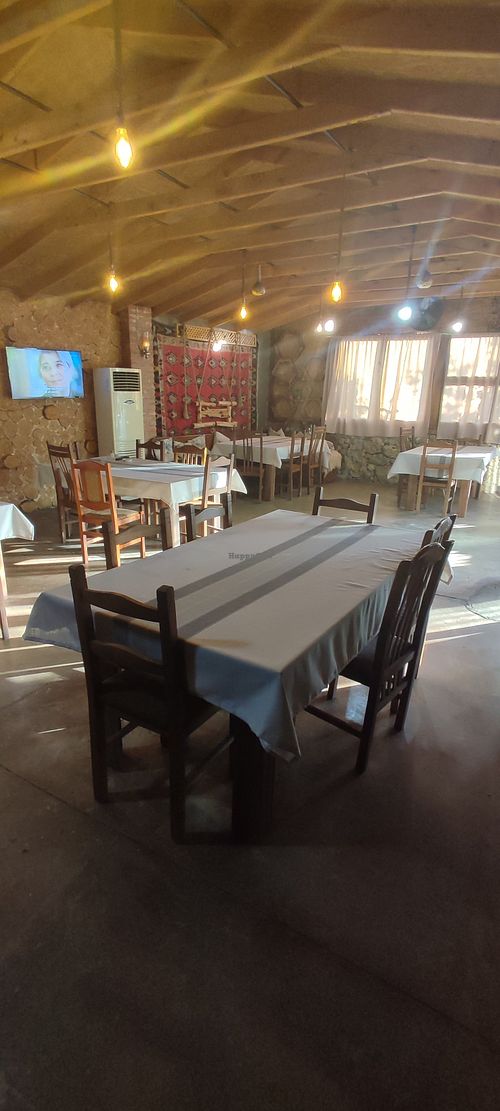 Indoor seating at Te Bujtina Tradicionale in Golem