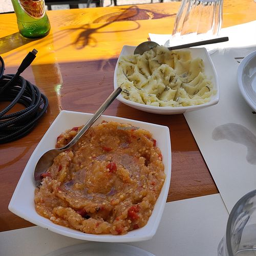 Aubergine dip, mashed potato dip at To Steki sti Gonia in Himare