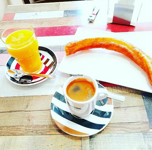 Porras, churros, café sólo, zumo de naranja natural. at Churrería Tejeringos in Tomelloso