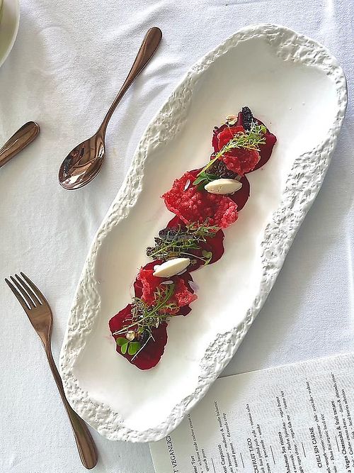 beetroot carpaccio with plant-based goat cheese and mulberry at The Seasons Restaurant in Takua Thung