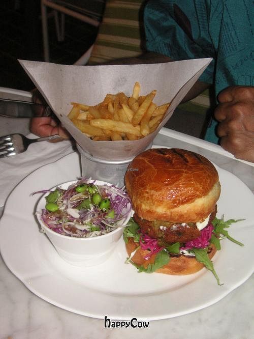 Falafel burger with side salad and chips at Botanical in Kuala Lumpur