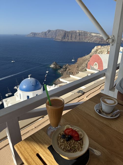 Acai bowl and smoothie. Fantastic views   at Terpsi n Oia in Oia