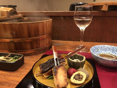 grilled tofu served with a mountain peach at Tosuiro in Kyoto