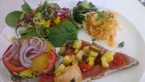 mixed plate including pizza slice and burger at Pure on Raw in Sheffield