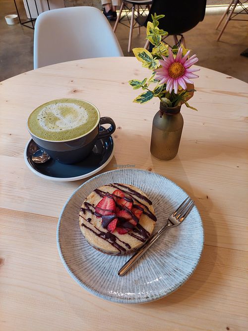 Tart and matcha latte at Booch Cafe in Riga