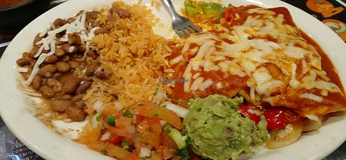 Vegan Enchiladas with added vegan chicken and guacamole instead of avo slices. at Pepito's in Riverside