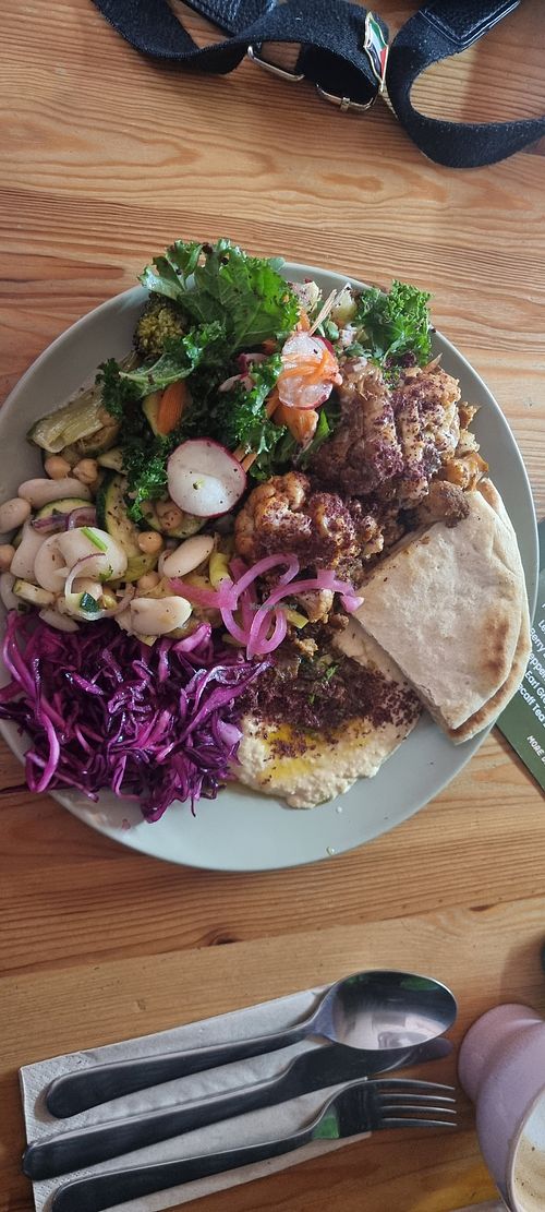 Large plate with roasted cauliflower, garlic hummus and 3 salads at Time for Mezze in Chorley