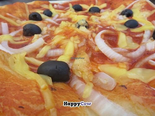 Tarte flambee with tomato sauce and vegan cheese at Ilse in Saarbrucken