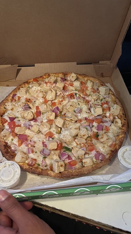Vegan butter chicken pizza 🍕  at Pizza Twist in Puyallup