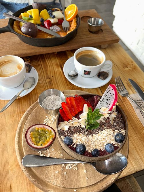 very berry bowl and tropical pancake  at Café Buur in Dusseldorf