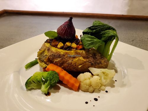 Stuffed Sweet Potato with black rice filing and balsamic reduction onion (blowhole) shaped like a whale! at Atlantis Restaurant in Puerto Galera