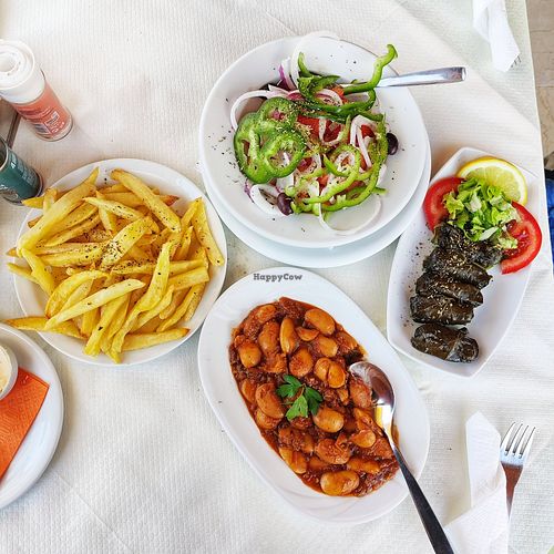 Fries, tomato salad, gigantes, dolmades at Blue Heaven - Γαλάζιος Παράδεισος in Corfu