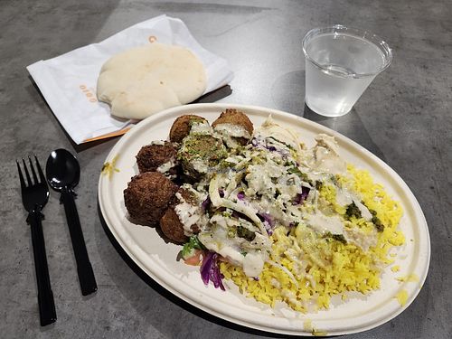 Falafel plate with all their Vegan sauces. at Naf Naf Grill in Morris