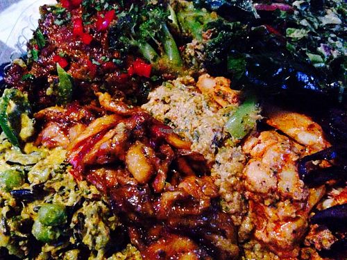 All sides with almond hemp burger entree- $15! at Khepra's Raw Food Juice Bar in Washington