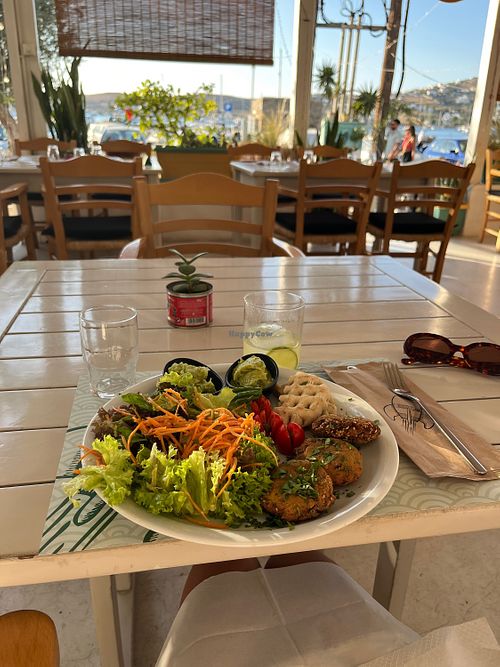 Very knowledgeable about vegan options and accommodating! They no longer serve the spring rolls in the other photo posted for this restaurant but the salad has peanut saucee  at The Little Green Rocket in Paros