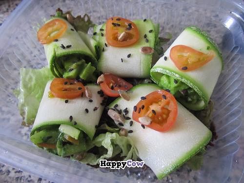 Zucchini rolls stuffed with fresh vegetables in pesto dressing at Yami in Lima