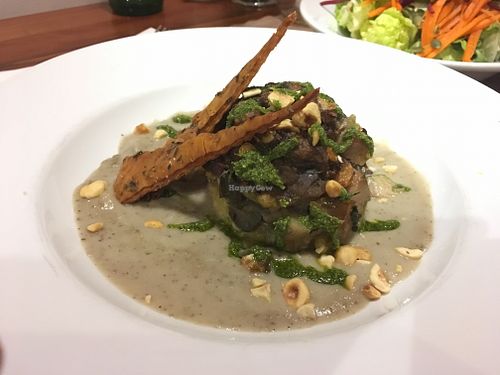 On a topinambur cream, a dish with aubergine and artichokes at Quinoa in Las Condes