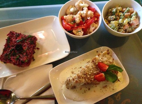 Carrot cake with vanilla cream, cauliflower salad, Russian salad, Beet with tofu at Samadeva in St Petersburg