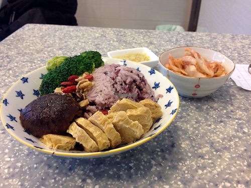 chewy mushroom rice & side of kimchi at Veggie Mama in Kowloon