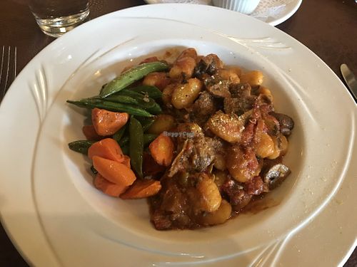 Gluten free, Vegan Potato Gnocchi with Roasted Tomatoes, Mushrooms, Spinach
White Wine Sauce  at The Cabin Bar & Grill in Big Sky