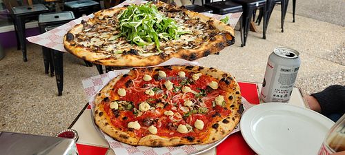 Small tables at Franc Jr's Famous Pizzeria in Coolangatta
