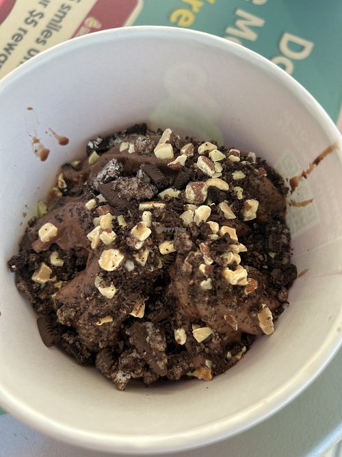 Vegan chocolate mousse fro yo with almonds and Oreos. 🤤  at Menchie's Frozen Yogurt in Citrus Heights