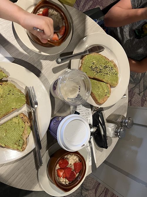 Very tasty avocado toast, oatmeal with berries, side of oat milk  at SPoT Coffee in Niagara Falls