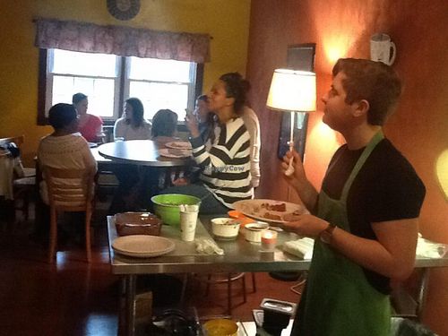 After a raw vegan hands-on workshop, students and employees enjoy the feast they learned to make.  at Superfoods Cafe & Market in Mt Airy