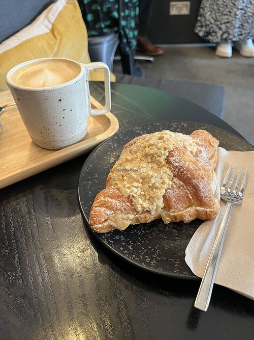 Vegan pastry and oat milk latte  at Metronome in Morden